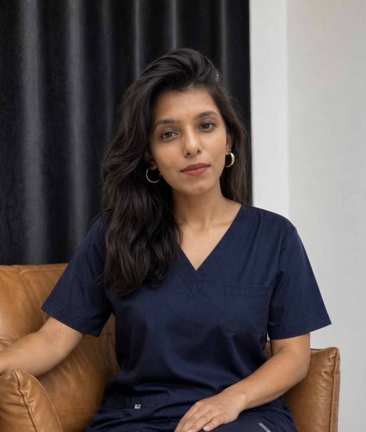 Portrait of Dr. Meghana Jain in surgical scrubs